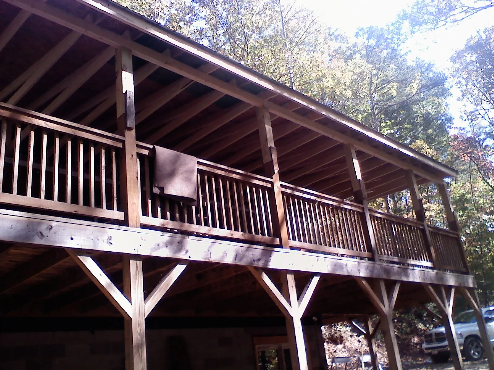 Timber framing under a new elevated porch and deck — Roof Leak Repair in Lewisville by Roofing Brothers